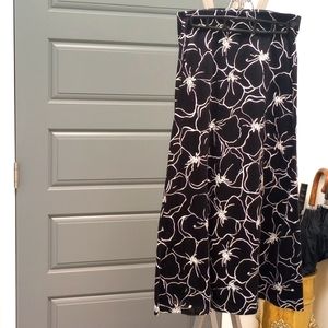 Black and white floral pattern full length skirt.
